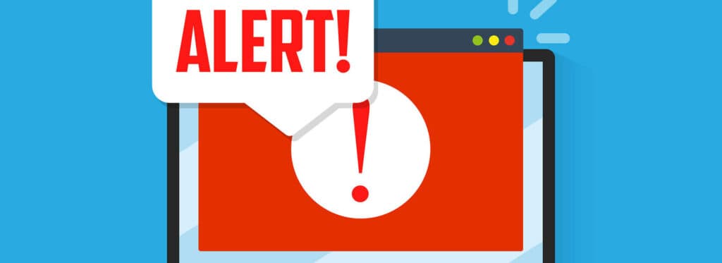 alert sign on laptop