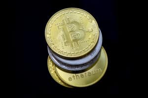Stack of Bitcoins, Ethereum, Litecoin, Ripple and other crypto currencies