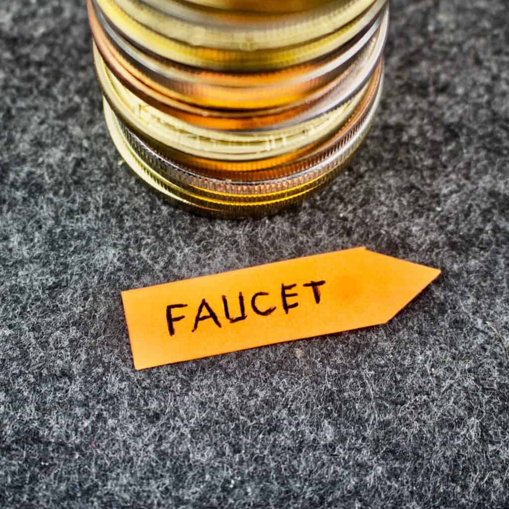 Faucet arrow near gold tokens