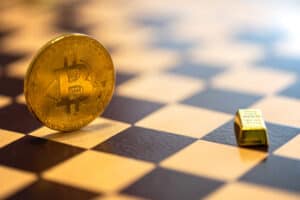 Bitcoin vs gold on chessboard