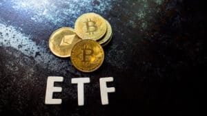 Bitcoin coin with ETH. and ETF text Put on dark background, Concept Entering the Digital Money Fund.