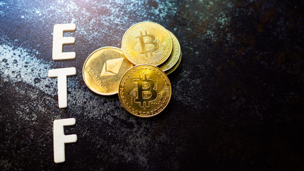 Bitcoin coin with ETH. and ETF text Put on dark background, Concept Entering the Digital Money Fund.