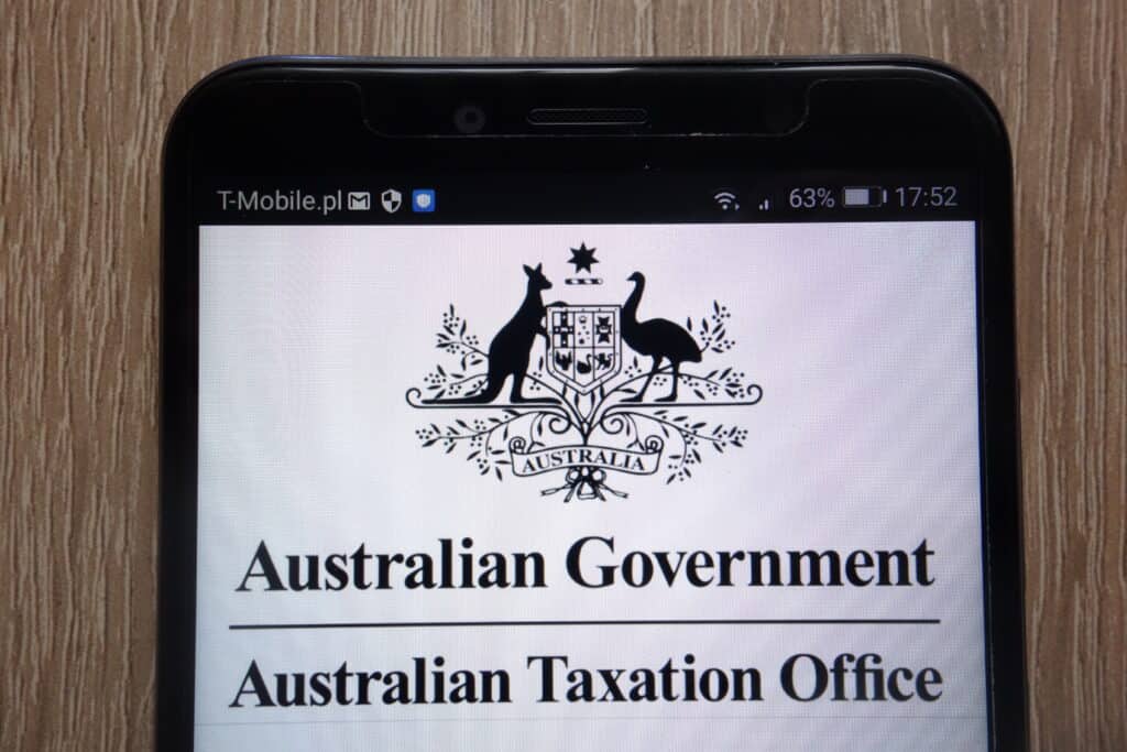 Australian Government - Australian Taxation Office logo displayed on a modern smartphone.