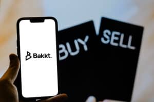Bakkt company logo on the smartphone screen.
