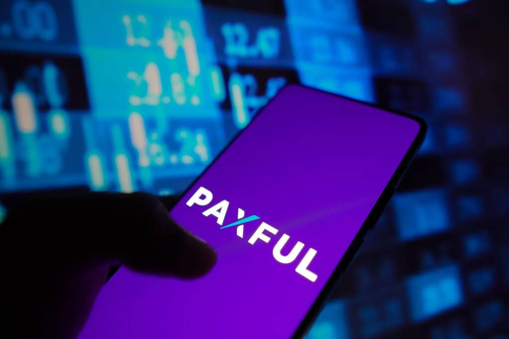 Paxful logo displayed on a smartphone screen.