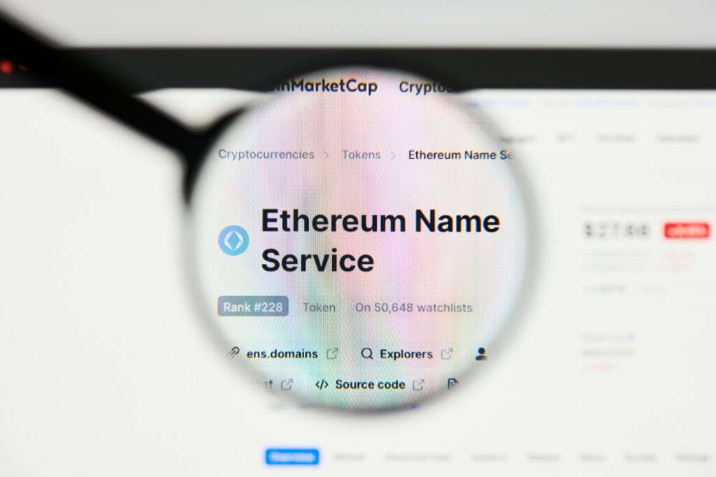 ENS coin logo visible through a loope.